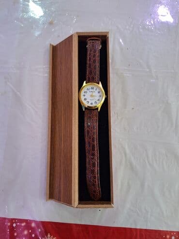 irshad telecom is saatlari: Б/у, Наручные часы, Cartier, цвет - Золотой — 2