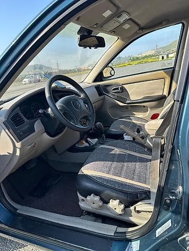 e motor: Hyundai Elantra: 2 l | 2003 il Sedan — 2
