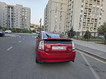 bmw e 39: Toyota Prius (2-ci nəsil) hibrid hetçbek - Rəng: qırmızı - Kuzov: 5 — 2
