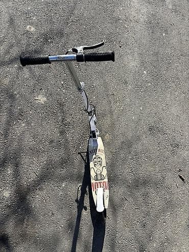 Məhsul 1: Şəhər skuter - Mexaniki (elektriksiz) iki təkərli skuter -