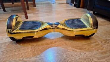 hoverboard qiymətləri: Qızılı rəngli 2 təkərli hoverboard (self-balance scooter) və dəmirdən — 1