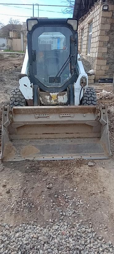 t 16 traktor: Bobcat S590 .servis texnikasi.veziyeti super.xerci yoxdu qaycili — 6