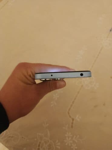 lazne kamere: Məhsul: Smartfon Xüsusiyyətlər və dizayn: - Sümükvari düz kənarlı — 3