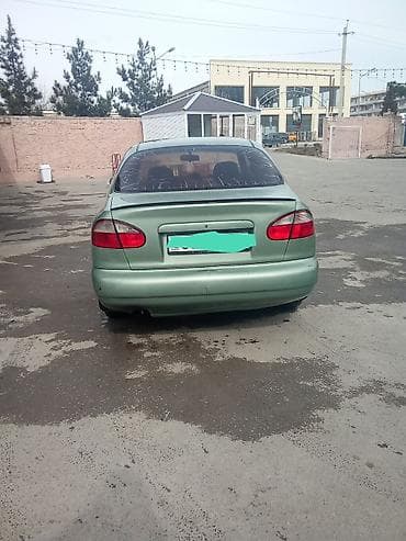 mersedes yan guzguler: Daewoo Lanos: 1.3 l | 2009 il Sedan — 4