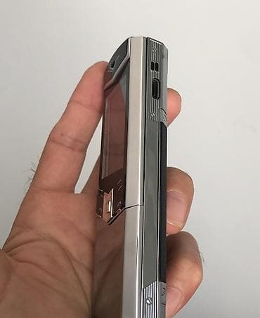 philips xenium x519: Vertu rəng - Qara, Düyməli — 2