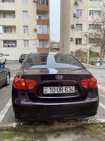 2000 e46 bmw: Hyundai Elantra: 1.6 l | 2007 il Sedan — 2