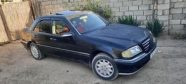 фольксваген пассат 1: Mercedes-Benz C-Sinif sedan (W202), qara rəng. - Kuzov: 4 qapı, sedan — 1