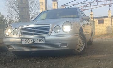 traktor şəkilləri: Mercedes-Benz E 230: 2.3 l | 1995 il Sedan — 6