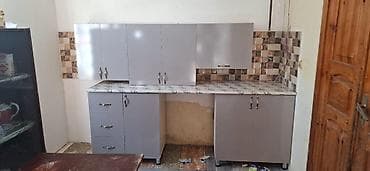 kunc dolablar: Zeytun-yaşıl rəngli mətbəx mebel dəsti. Üst və alt şkaflardan ibarət — 4