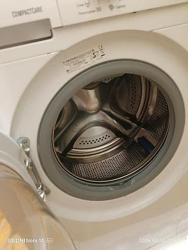 iphone 16 pro max kreditle: Electrolux CompactCare paltaryuyan maşın. Öndən yükləməli modeldir — 1
