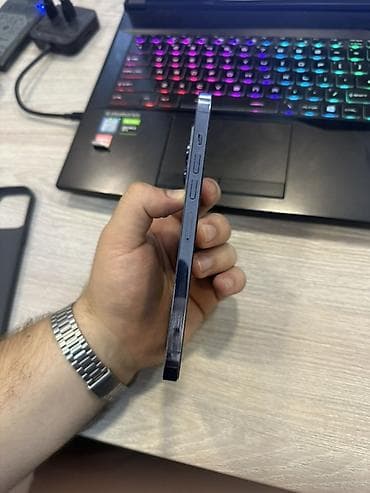 5: IPhone 13 Pro Max, 128 GB, Sierra Blue, Face ID — 7
