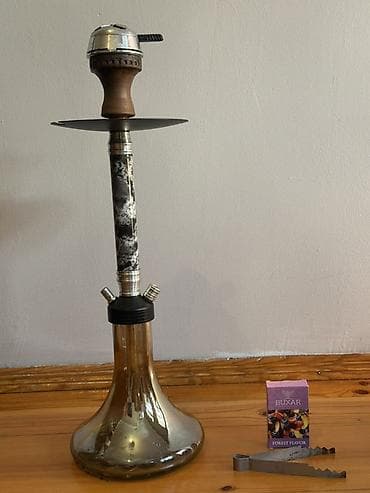Qelyan desti Komur + tutun+ musduy+ kaloud ustunde gerseyi var . Apar