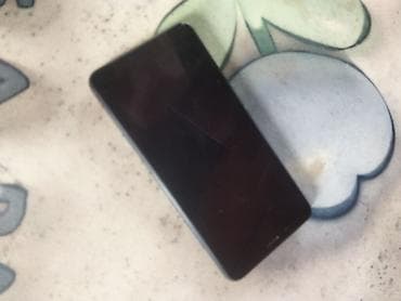 tikanlı tel: Smartfon – qara rəng - Ekran: təxminən 5.5–5.7 düym, HD/Full HD sinfi — 2