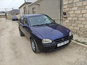teker 14: Opel Corsa B, 5 qapı, tünd bənövşəyi rəngli hetçbek. Xüsusiyyətlər: - — 1