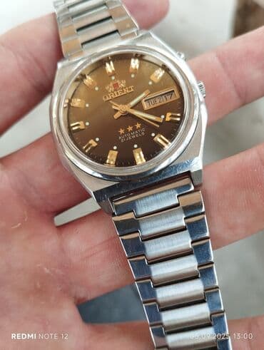 omega qol saatı: İşlənmiş, Qol saatı, Orient, rəng - Qızılı — 2