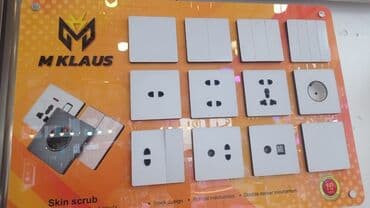 Генераторы: MKlaus brendinə məxsus ağ rəngli elektrik açarları və rozetkaları — 1