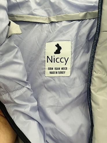 jılet: Niccy brendi qadın üçün yastı tikişli puffa jilet - Rəng: boz - Ölçü — 2