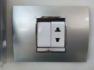 dubay şokoladı qiyməti: Gümüşü rəngdə olan bu elektrik yuvası və açarı, müasir dizaynı ilə — 1