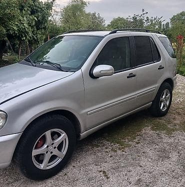 yasti pencelik: Mercedes-Benz ML (W163) – gümüşü rəngli, 5 qapılı SUV. Xüsusiyyətlər — 4