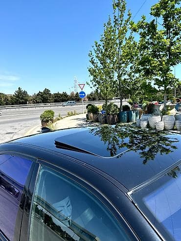 купить бмв: BMW 5 Series E39 sedan – qara rəng, M-paket üslublu eksteryer — 9