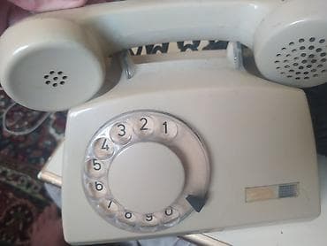 Stasionar telefon Simli, İşlənmiş, Ünvandan götürmə