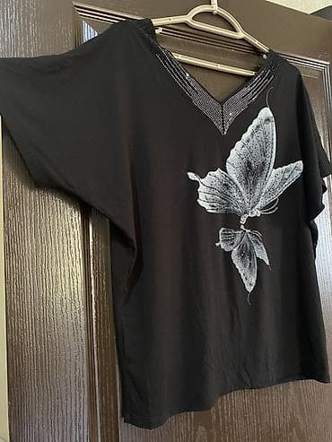 Qadın köynəyi – qara rəng, V-yaxa, qısa qollu. Ölçü 40-L. 42-XL. Tam — 2