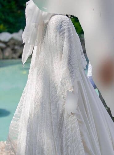 Məhsul: Ağ gəlinlik və duvaq komplekti Təsvir: 650 azne tikilib. 350