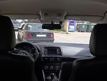 bmw x1 20d xdrive: Mazda CX-5: 2 l | 2014 il Krossover — 5