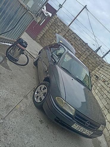 ford satış: Opel Astra F hatchback Xüsusiyyətlər: - Korpus: 5 qapılı hatchback - — 2