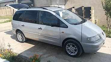 yan guzguler: Volkswagen Sharan miniven - Kuzov: gümüşü rəng, 5 qapı, relslərlə dam — 9