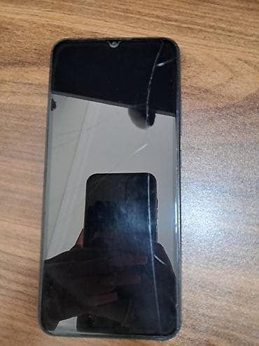 telefonlar 2ci el: Android smartfon - Arxa tərəfdə karbon naxışlı qara qoruyucu örtük - — 2