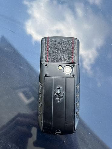 очки с камерой баку: Ferrari temalı lüks düyməli telefon - Korpus: qara rəng, mat-metal və — 3