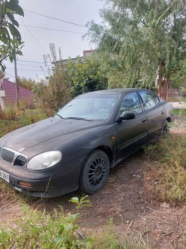 mersedes disk teker: Daewoo Leganza: 2 l | 1998 il Sedan — 4