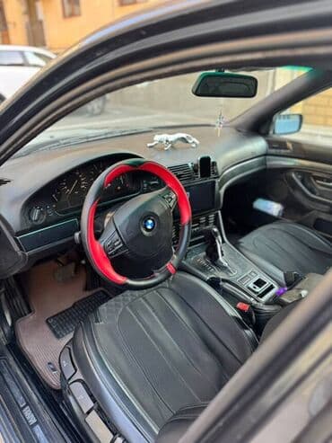 aston martin db7 5.9 at: BMW 5 series: 2.5 l | 1996 il Sedan — 2