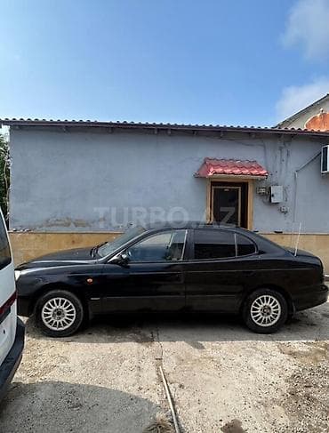Продажа авто: Daewoo Leganza: 2 л | 1998 г. Седан — 4