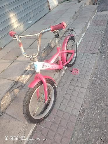 velosiped a: Uşaq velosipedi – 16” təkərli, çəhrayı-ağ rəng - Çərçivə: polad, aşağı — 5