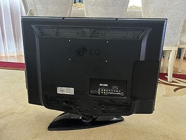 korpus hp: LG LCD televizor - Ekran diaqonalı təxminən 24–26 düym, parlaq qara — 2