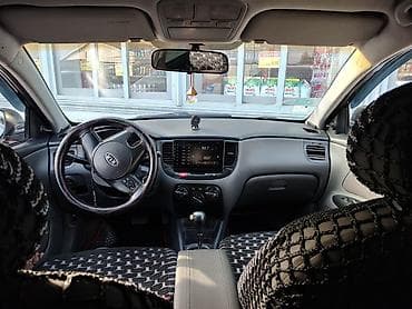 kia ceed 2010: Kia Rio: 1.4 l | 2010 il Sedan — 7