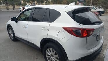 Aksesuarlar və tüninq: Mazda CX-5, ağ rəngli, benzinli krossover. Texniki və dizayn: - — 5