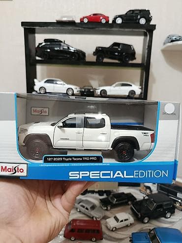 mini disk: Maisto Special Edition kolleksiyası – 1:27 miqyaslı 2023 Toyota Tacoma — 1