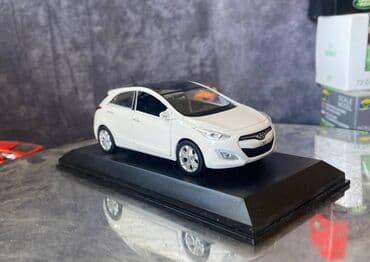 maşın modeli: Коллекционная модель Hyundai i30 5 door white 2012 Pino B&D Scale — 14