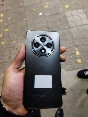 xiaomi mi 12t qiymeti: Smartfon – böyük tam ekran, mərkəzdə “punch‑hole” ön kamera və ekrana — 2