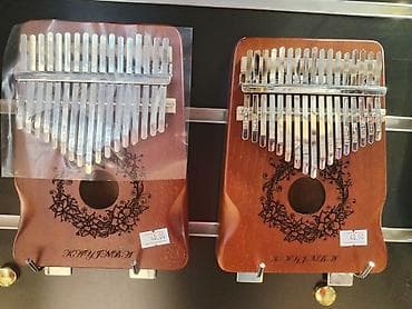 Kalimba Kalimba 8 Marta özəl endirim 🎁 Təsviri: Taxta gövdəyə — 1