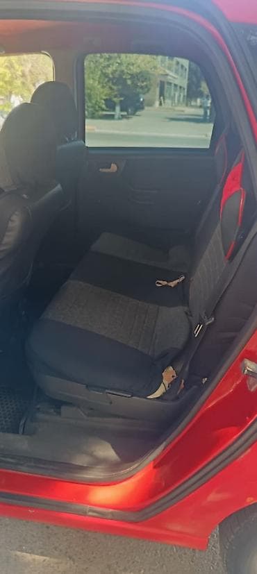 nissan note mini: Opel Meriva, qırmızı rəngli, şəhər və ailə istifadəsi üçün rahat — 7