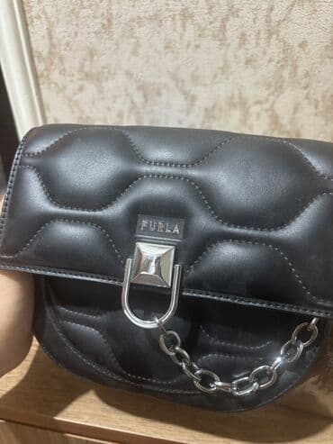 Əl çantası, İşlənmiş