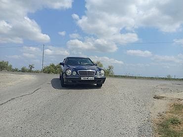 07 salon: Mercedes-Benz E-Class (W210) sedan - Kuzov: tünd mavi, 4 qapılı sedan — 7