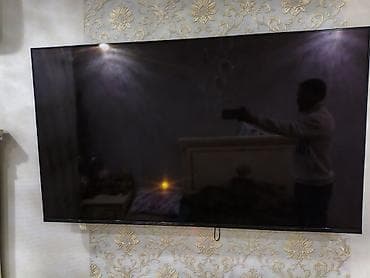 Televizor: HOFFMANN 55EU8000 - Ekran: 55 düym, nazik çərçivəli dizayn — 2