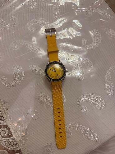 işlənmiş saat: Doxa saat. Dubaydan alınıb. 5500aed. Pasportu ve qutusu yoxdur. Unisex — 6