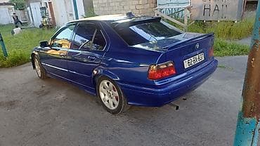 kia cerato 2011: BMW 3 series: 1.8 l | 1993 il Sedan — 6