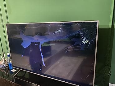 televizor panasonic: Televizor – LED panel, təxminən 55–60 düym ekran ölçüsü, nazik — 2